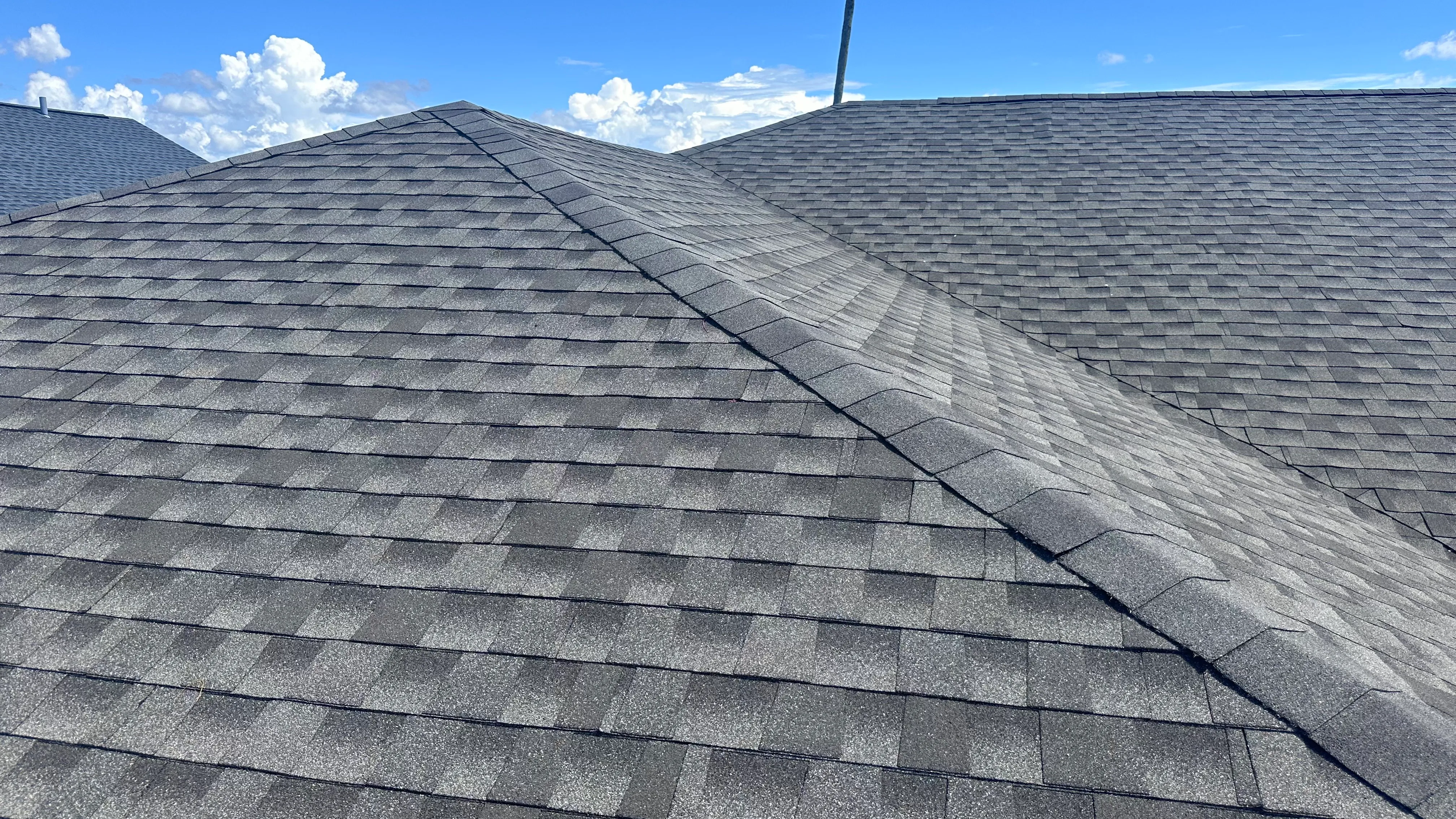 Installed gray asphalt shingle roof