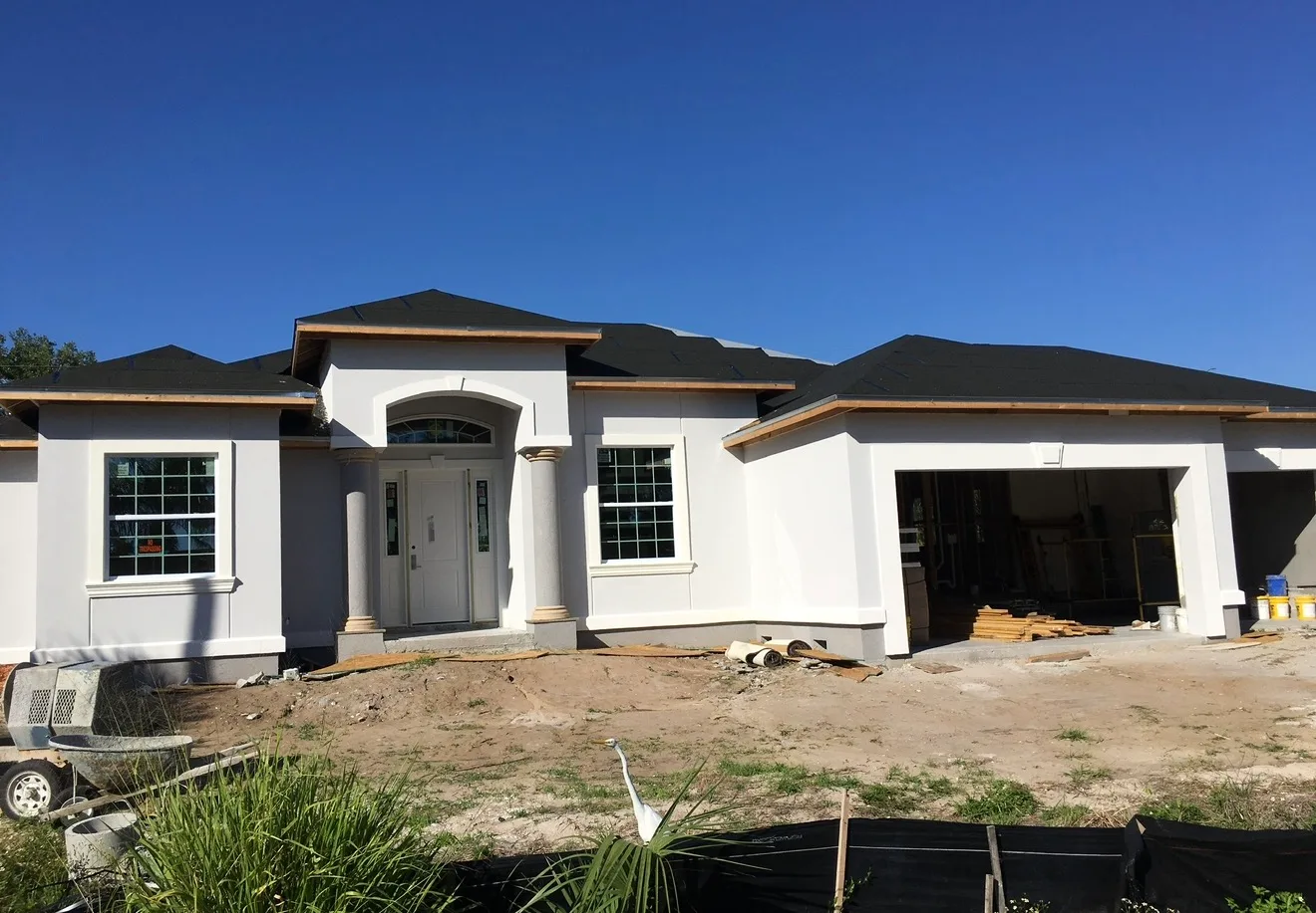 Modern white residential house under construction