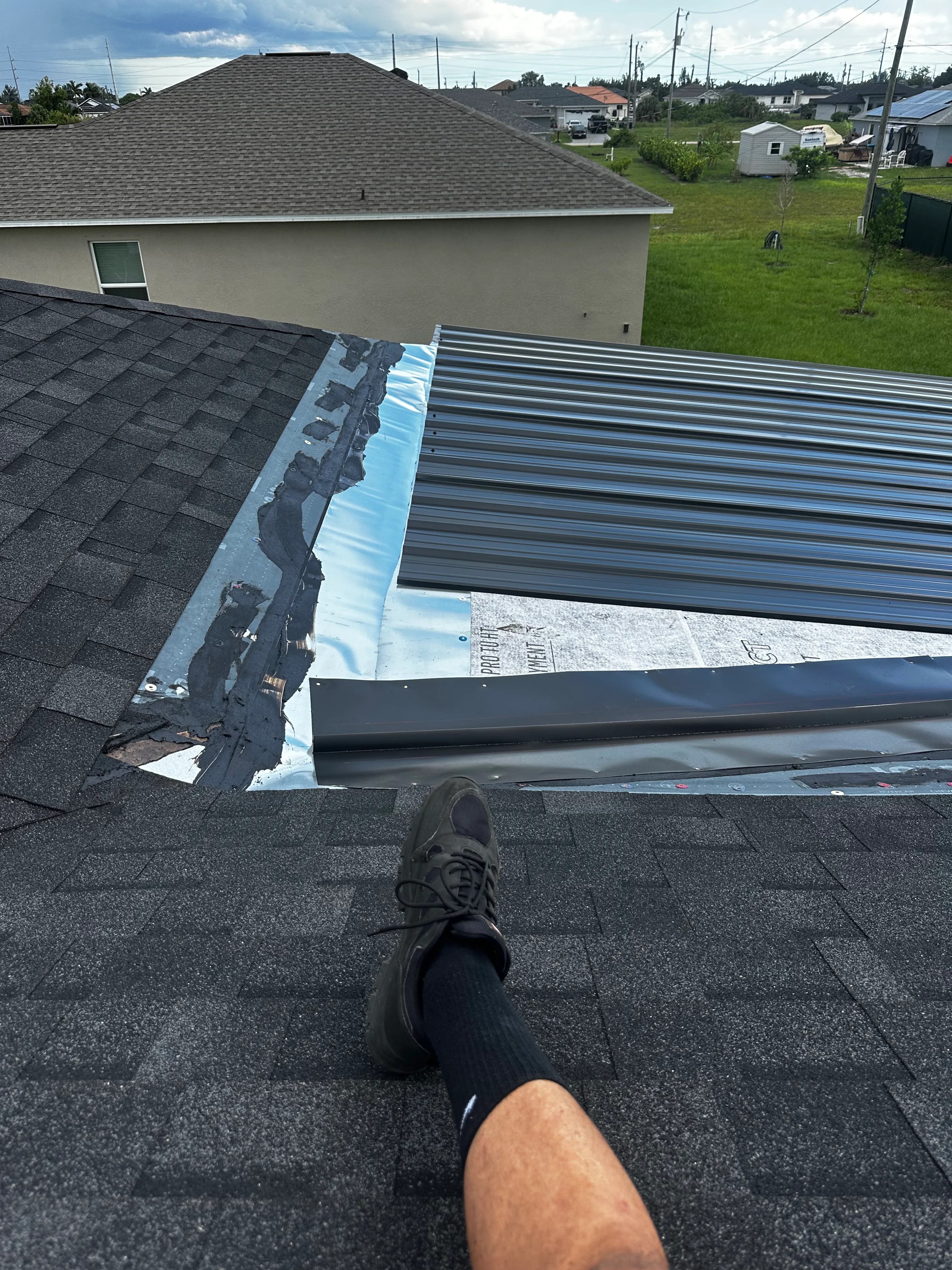 Metal roofing installation on residential home