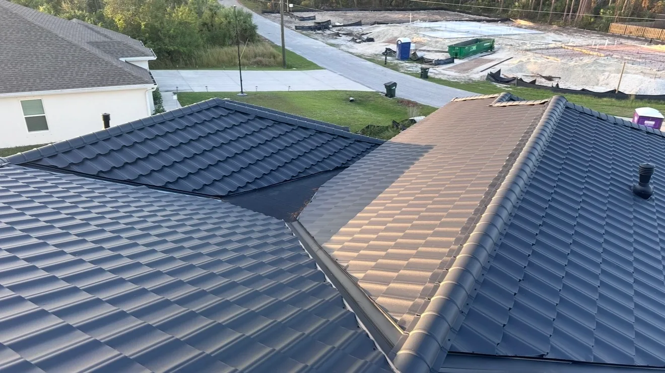 New roof installation with contrasting shingle sections