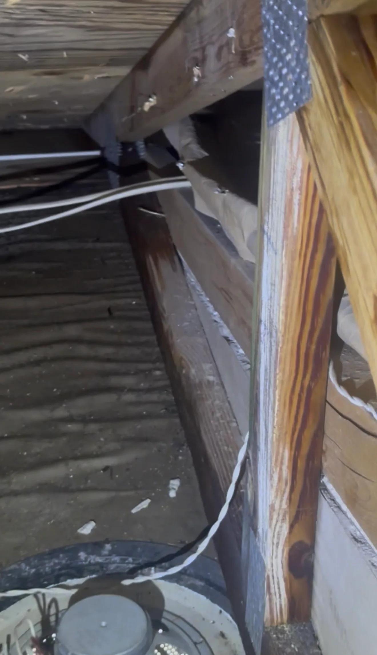 Metal gutter system installed along residential roof edge and fascia